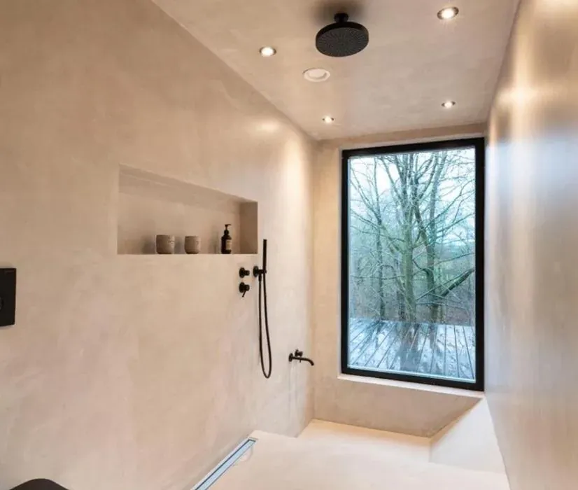 Microcement bathroom with gold fixtures Southern Utah