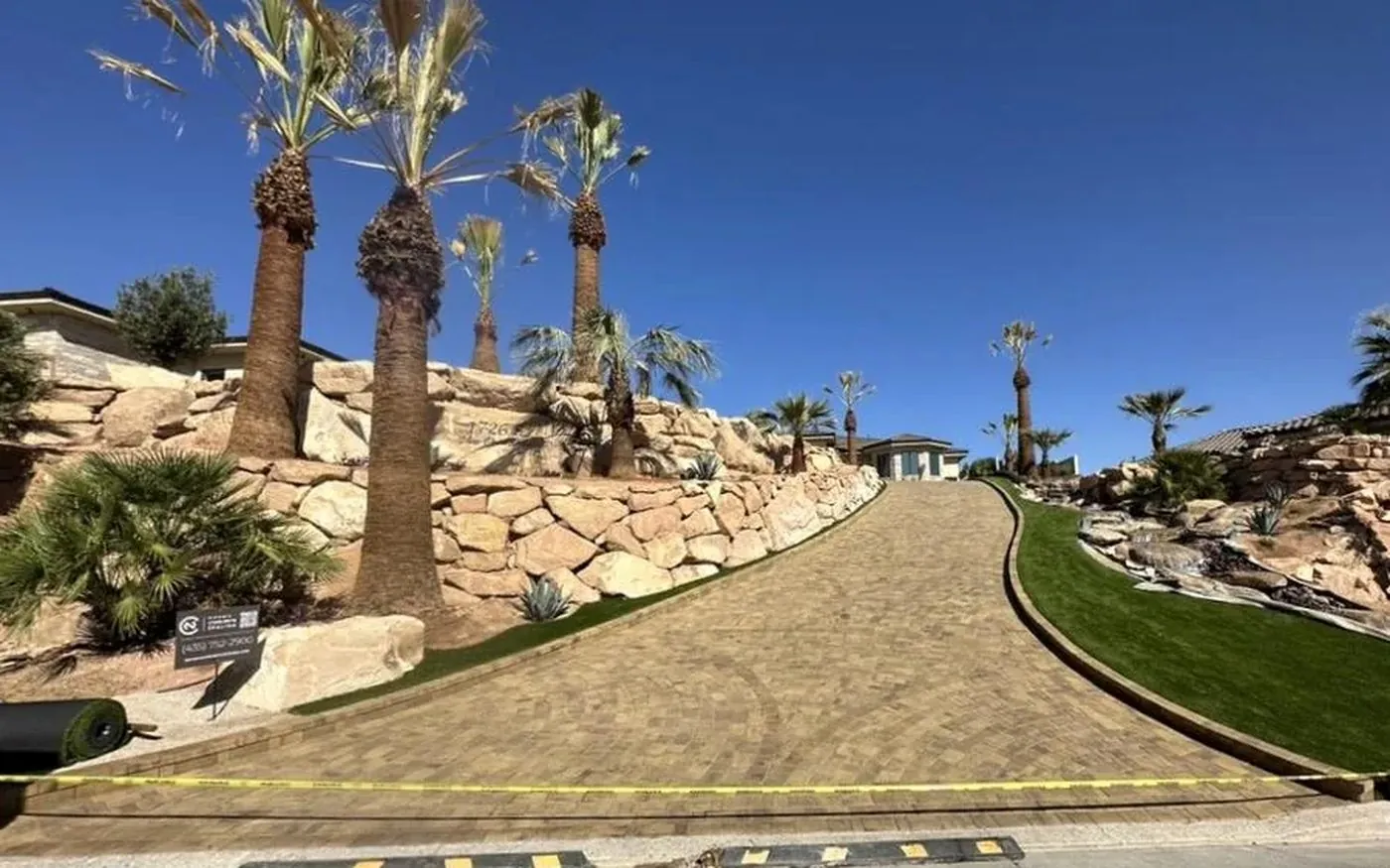 Same paver driveway after professional sealing — color enhanced