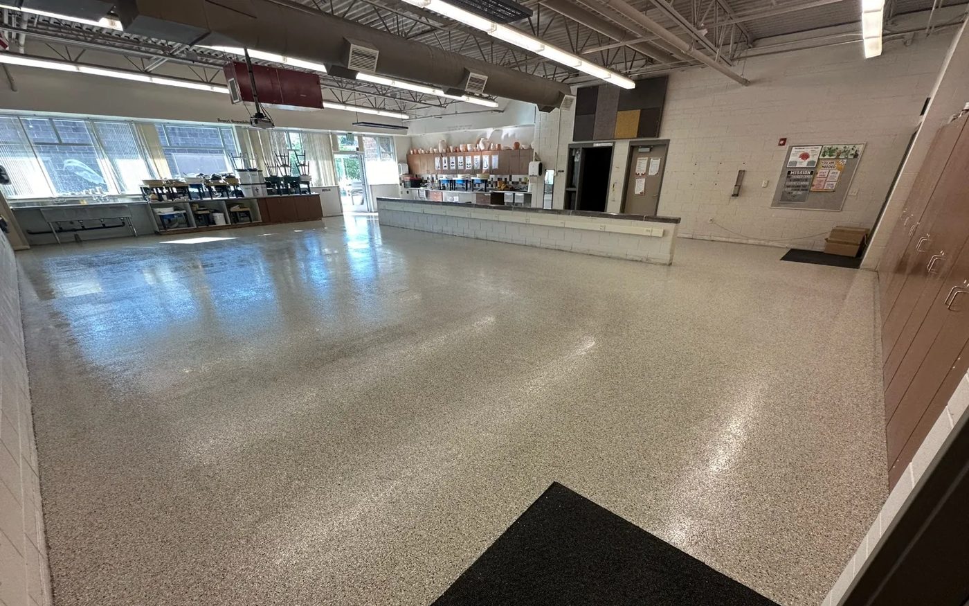 After epoxy flake floor coating — Nichols Concrete Sealing