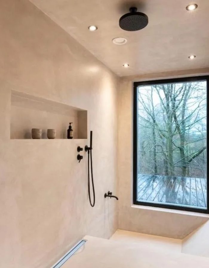 Luxury microcement bathroom gold fixtures Southern Utah